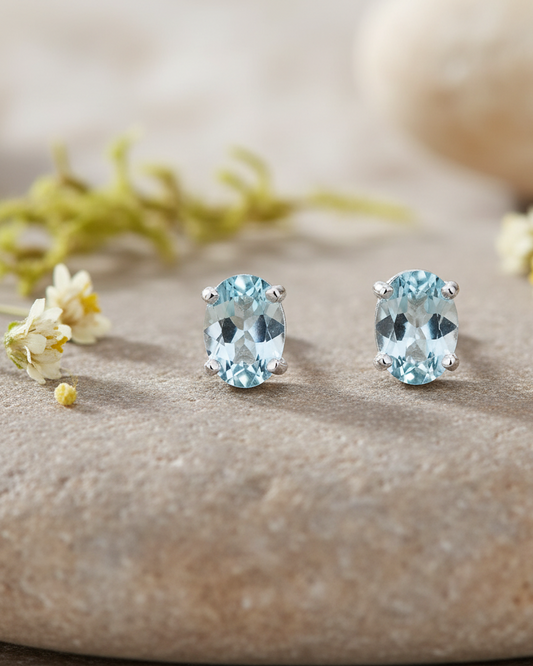 Brincos delicados de topázio azul