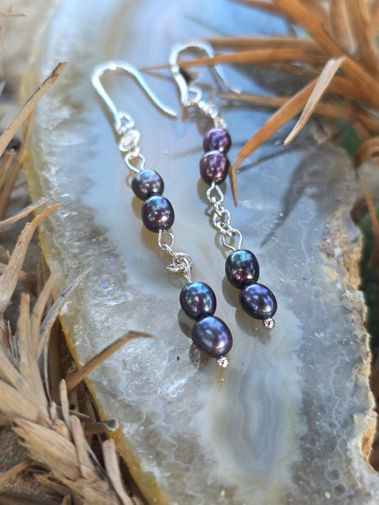 Brincos de pérola negra