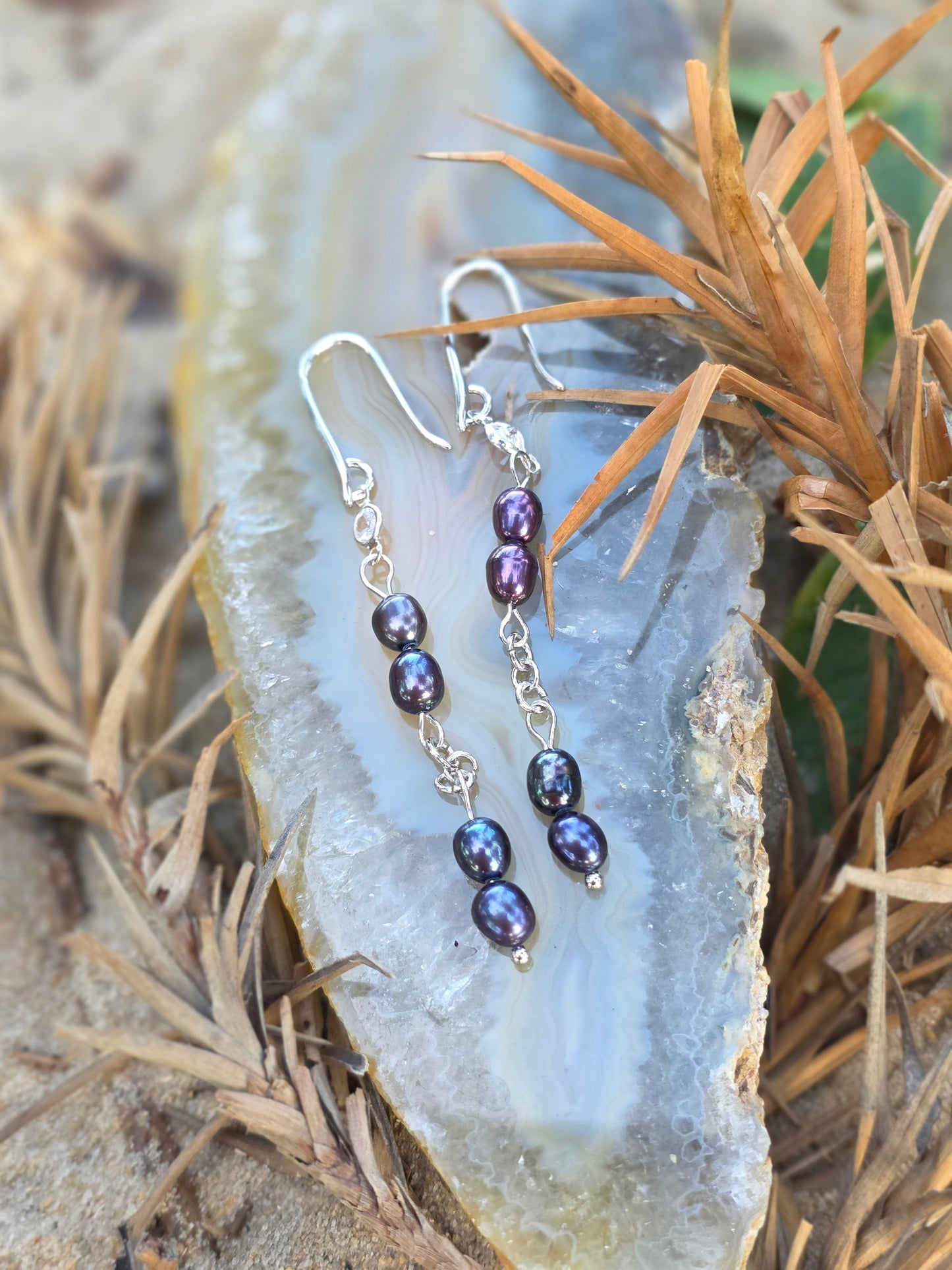 Brincos de pérola negra