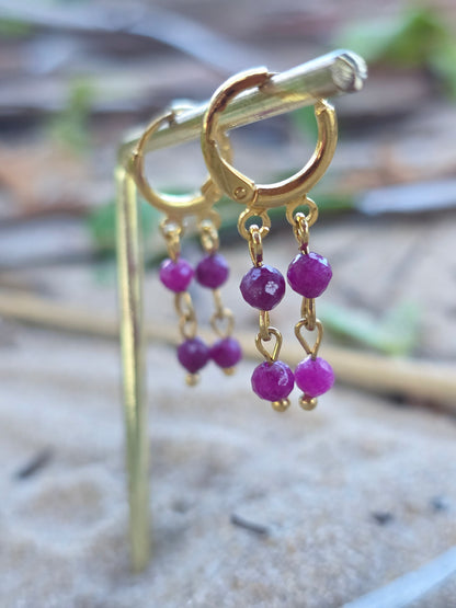 Brincos fluidos de rubi